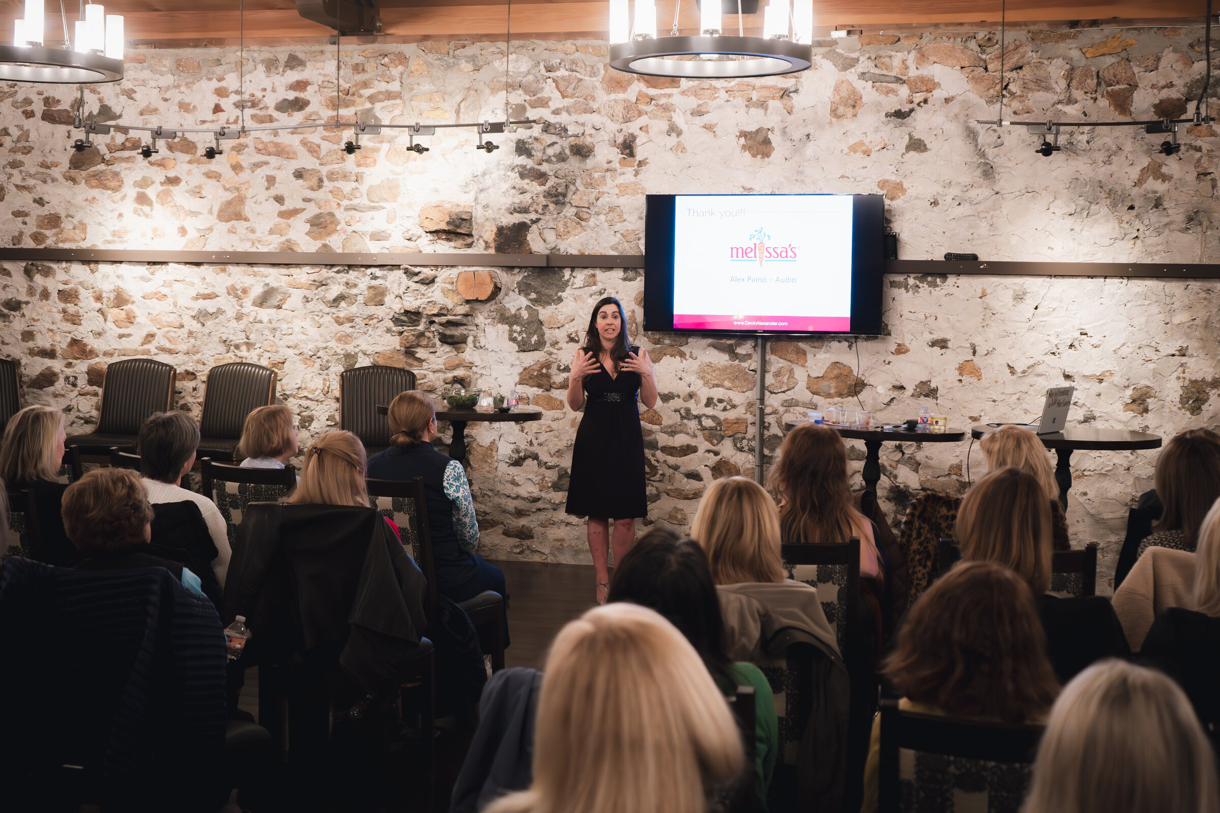 Devin Alexander speaking at an intimate women's event